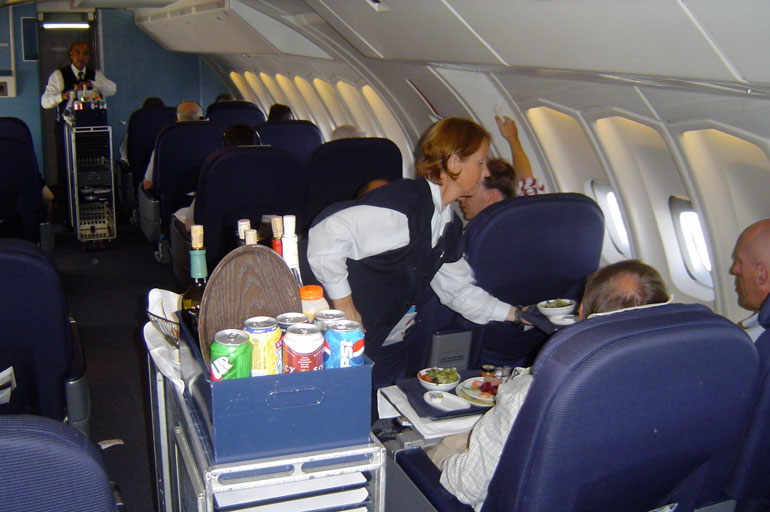 Don’t recline your seat during meal or snack service