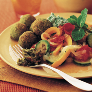 Braised vegetables with falafel and yogurt sauce | Reader's Digest Australia