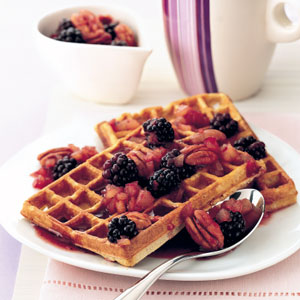 Pecan waffles with maple and blackberry sauce