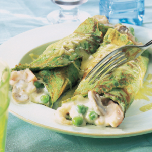 Spinach pancakes with smoked trout and prawns