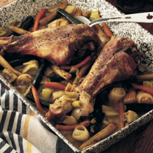 Turkey drumsticks braised with baby vegetables