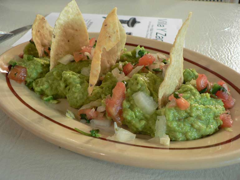 6. Dip corn chips in guacamole