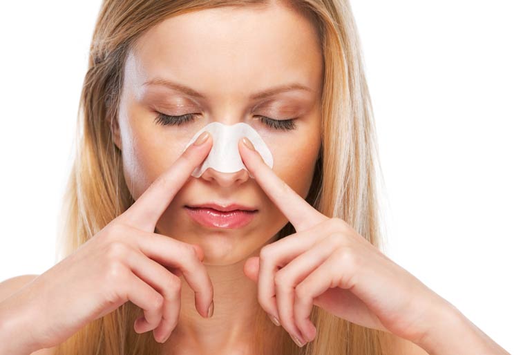 3. Slap on a nasal strip before bedtime