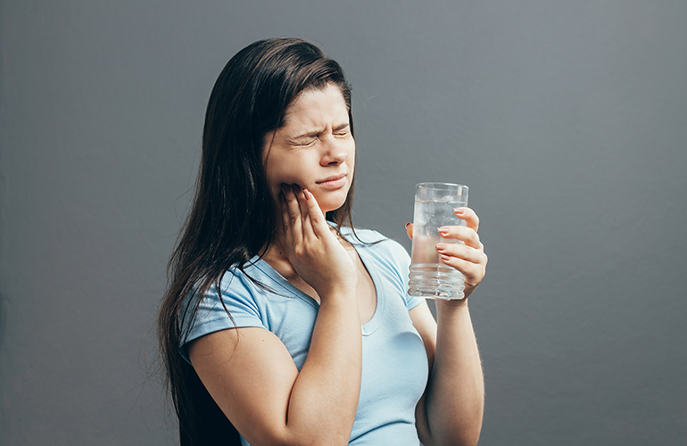 Tooth pain when you drink something cold