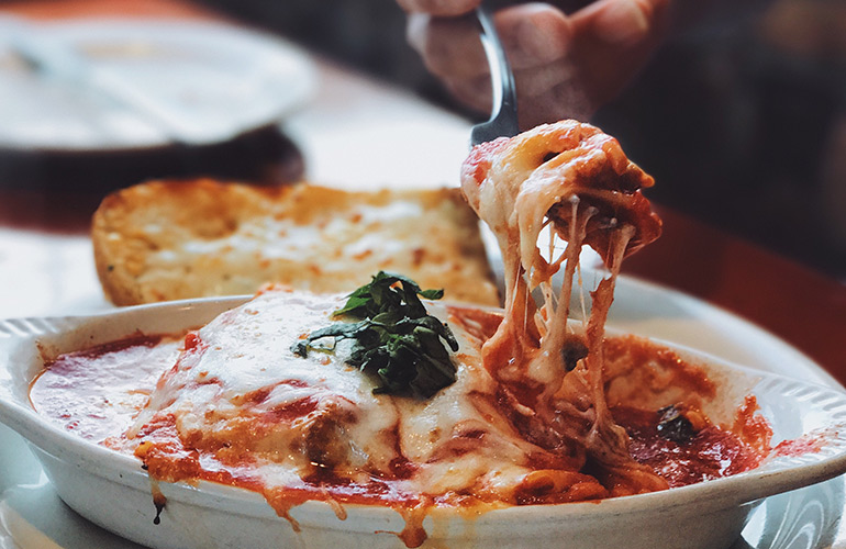 Eating high glycemic foods or large meals before bed
