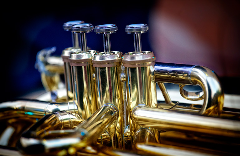 Use ammonia to remove tarnish from brass or silver