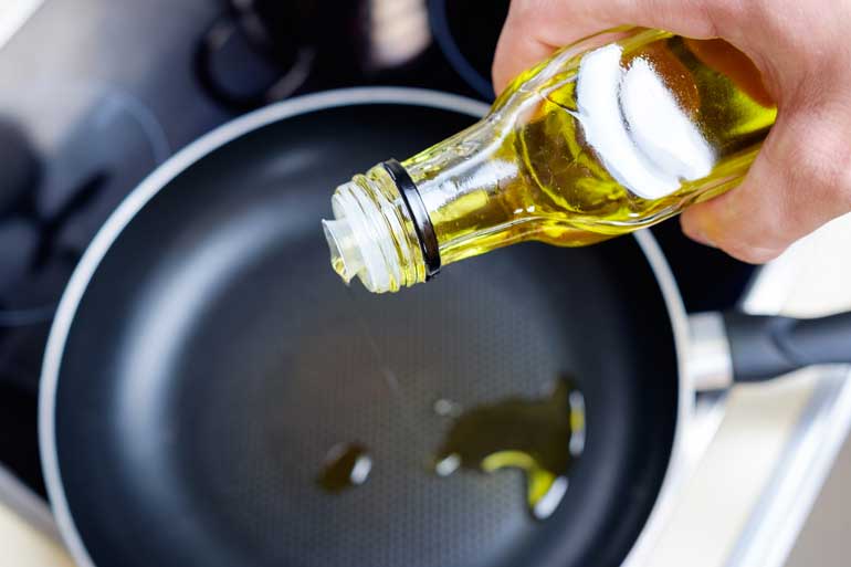 7. Polish wood surfaces: Use olive oil