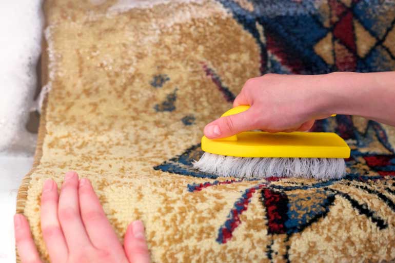 11. Clean your carpet or rug: Start with baby powder