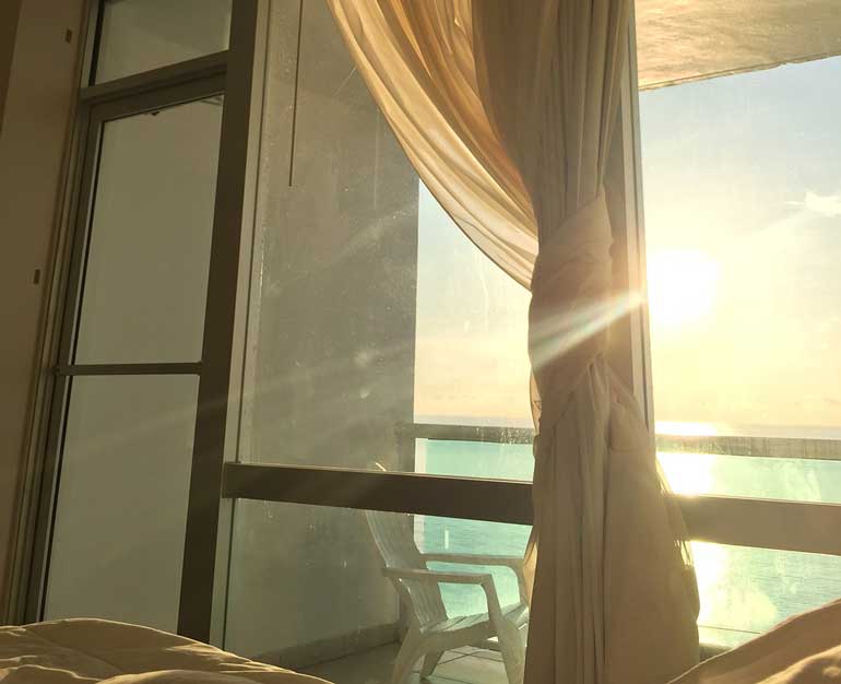 1. Go to sleep with your blinds or curtains open