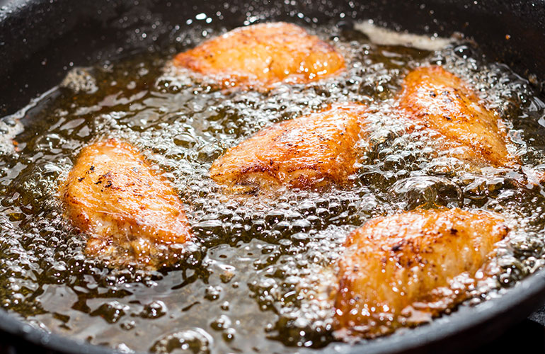 Dropping food into hot oil