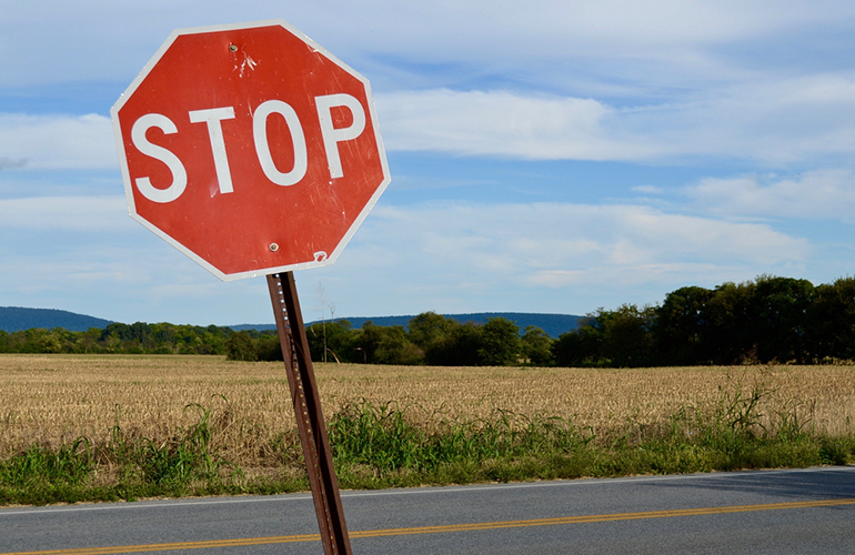 What’s ironic about the inventor of the stop sign?