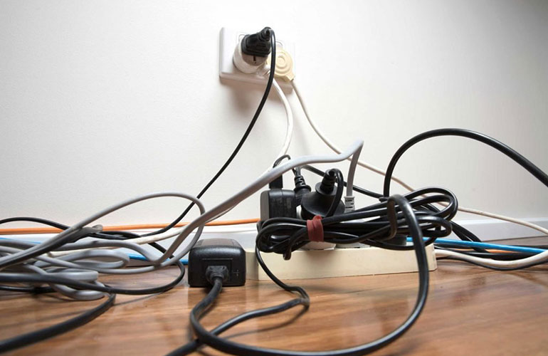 You fill your home with enticing power cords but yell at me when I chew them. Unfair!