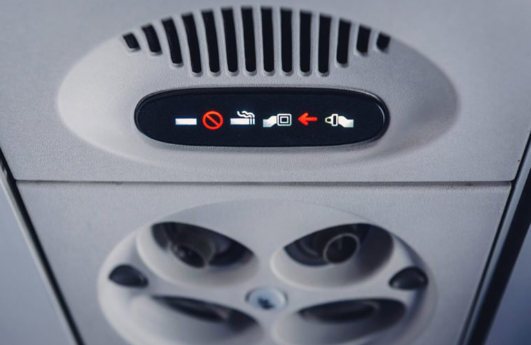 Why is the seatbelt sign turned on at 10,000 feet?