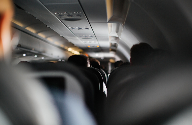 Why do cabin crews dim the lights when a plane lands?