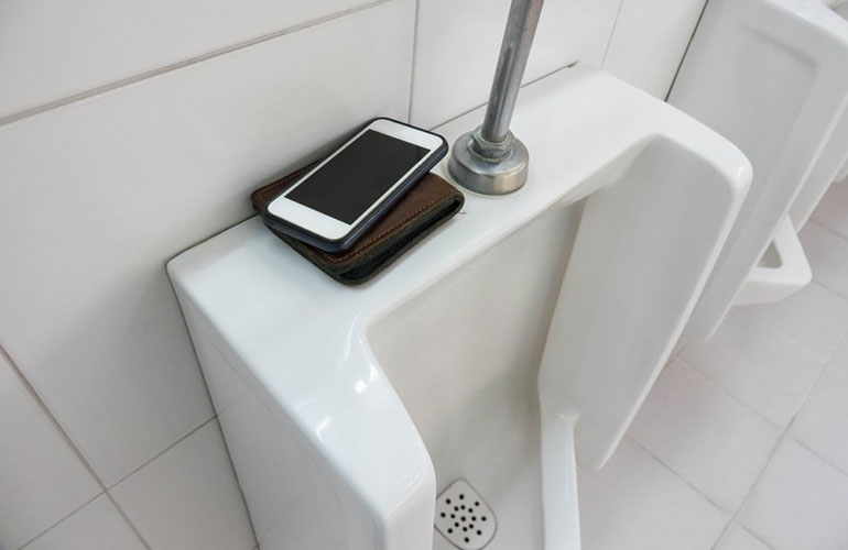 Not using your phone while doing your business