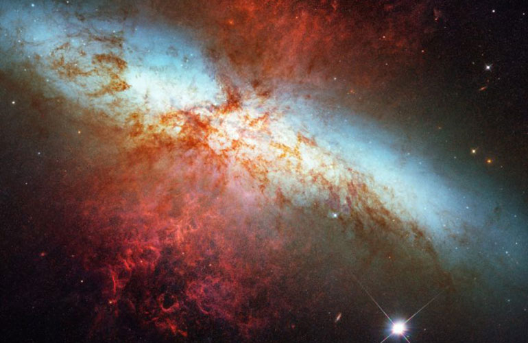 Why the universe glows with infrared light