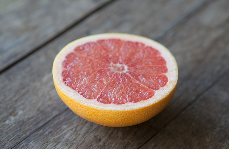 Eat half a grapefruit twice a week