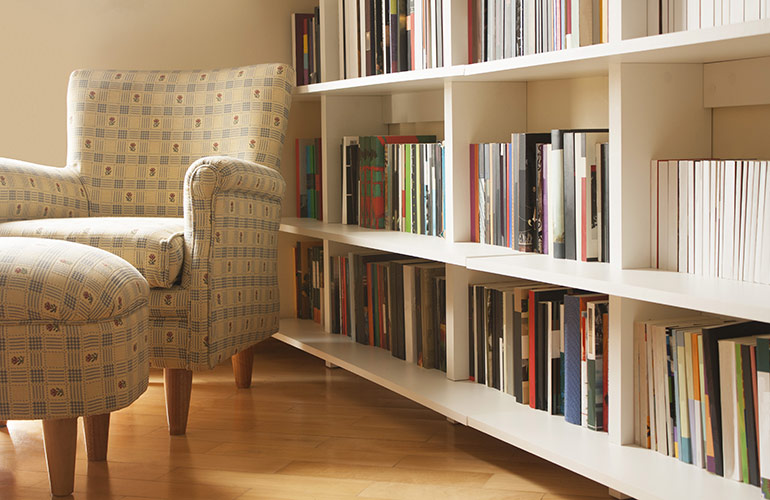 Floor-to-ceiling shelving also makes the most of a small space