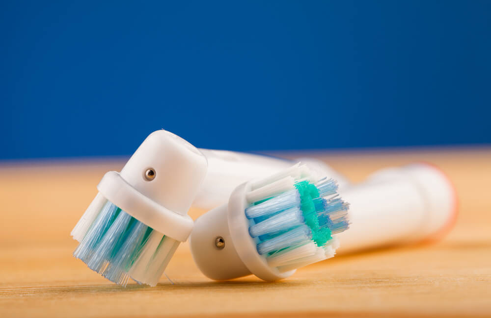 Brush your teeth twice a day with an electric toothbrush