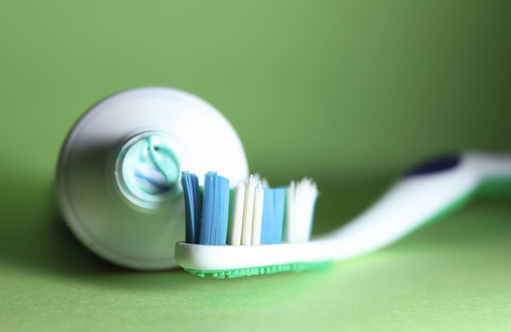 Use a fluoride toothpaste