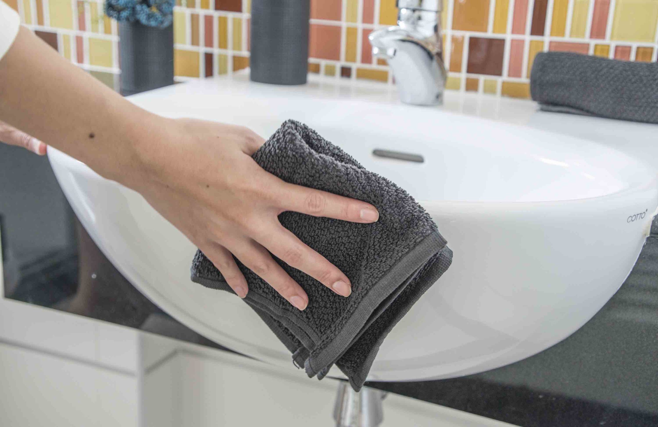 They wipe down the bathroom sink