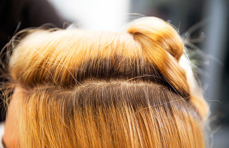 Try a temporary root concealer