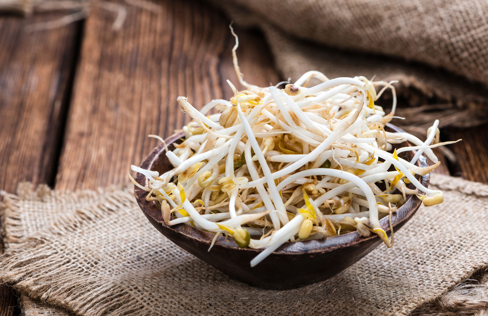 Garnish food with bean sprouts