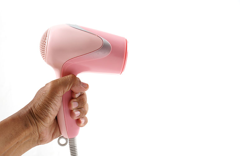 Use a hairdryer after applying deodorant