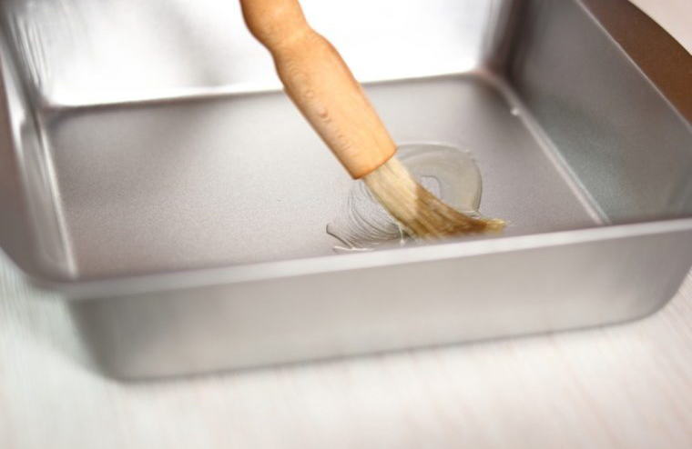 Not greasing the cake pan