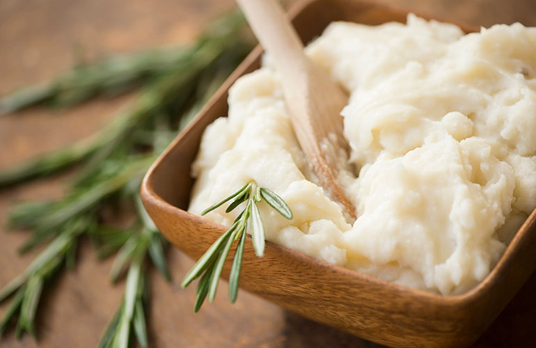 Use a colander to rice potatoes