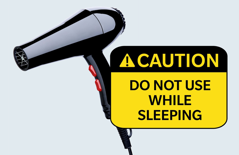 Warning label on a hairdryer: