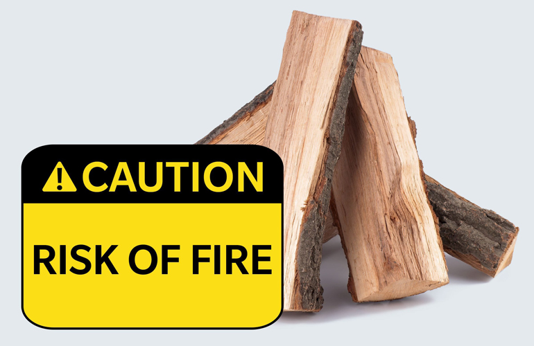 Warning label on a package of fireplace logs: