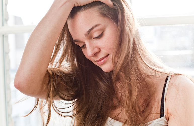 Touching your hair too frequently