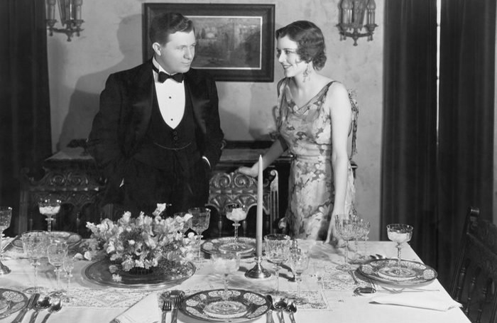 Old rule: A man would stand when a woman was seated with his group