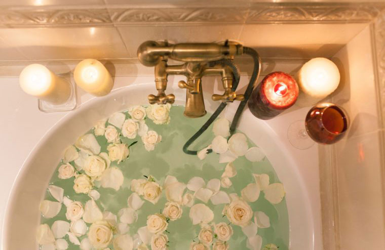 Take a scented bubble bath and watch your favourite movie