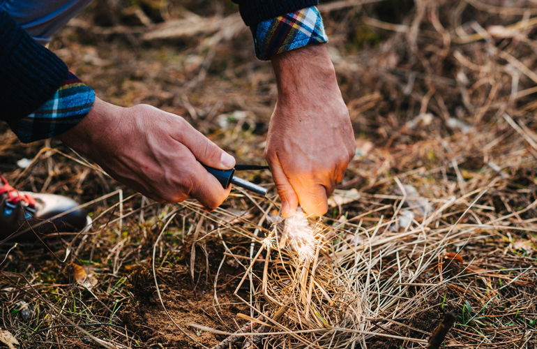 Not knowing how to light a campfire safely