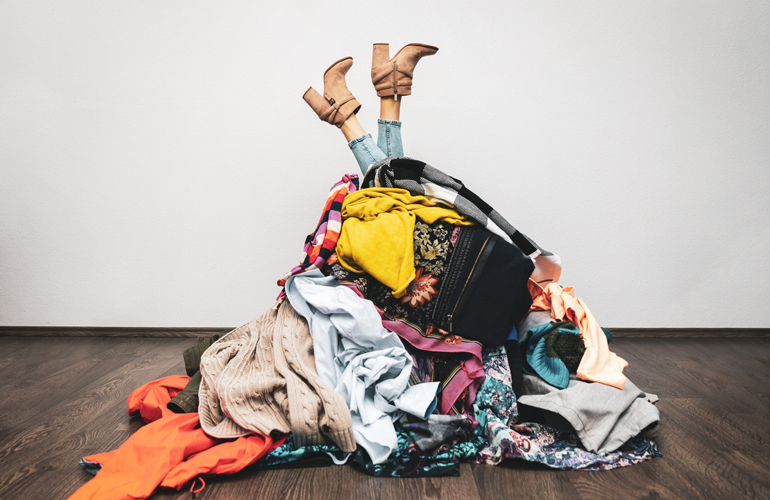 Buying so much that you own many items never worn or used