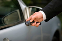 man opening car with key fob