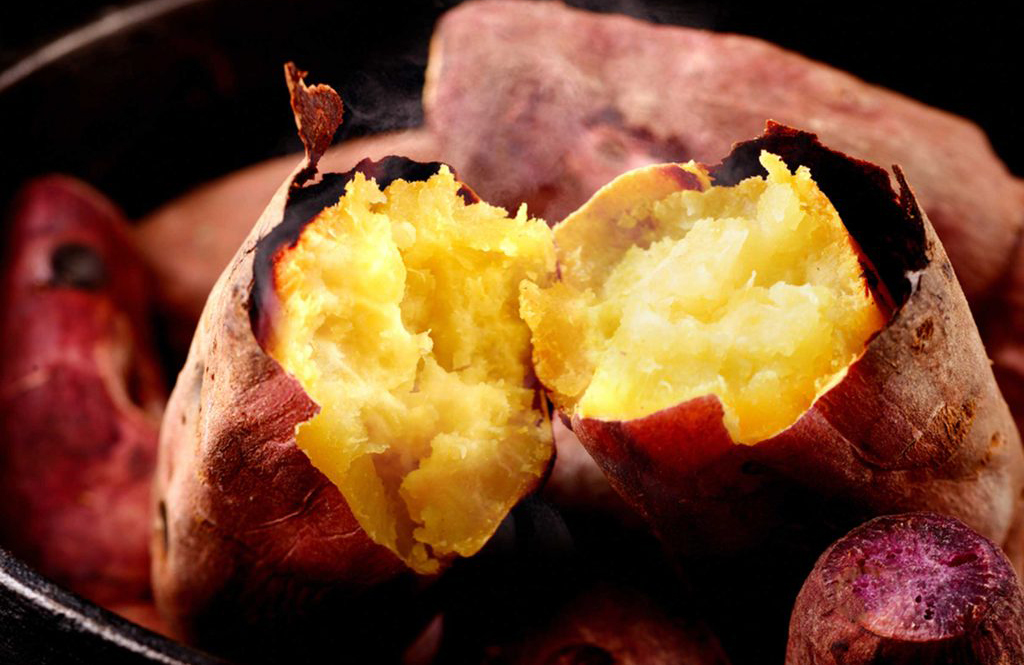 Top a baked potato with veggies from the salad bar