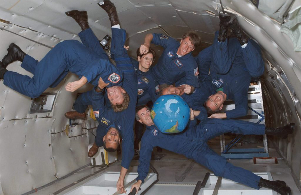 How can gravity be so strong and yet so weak?