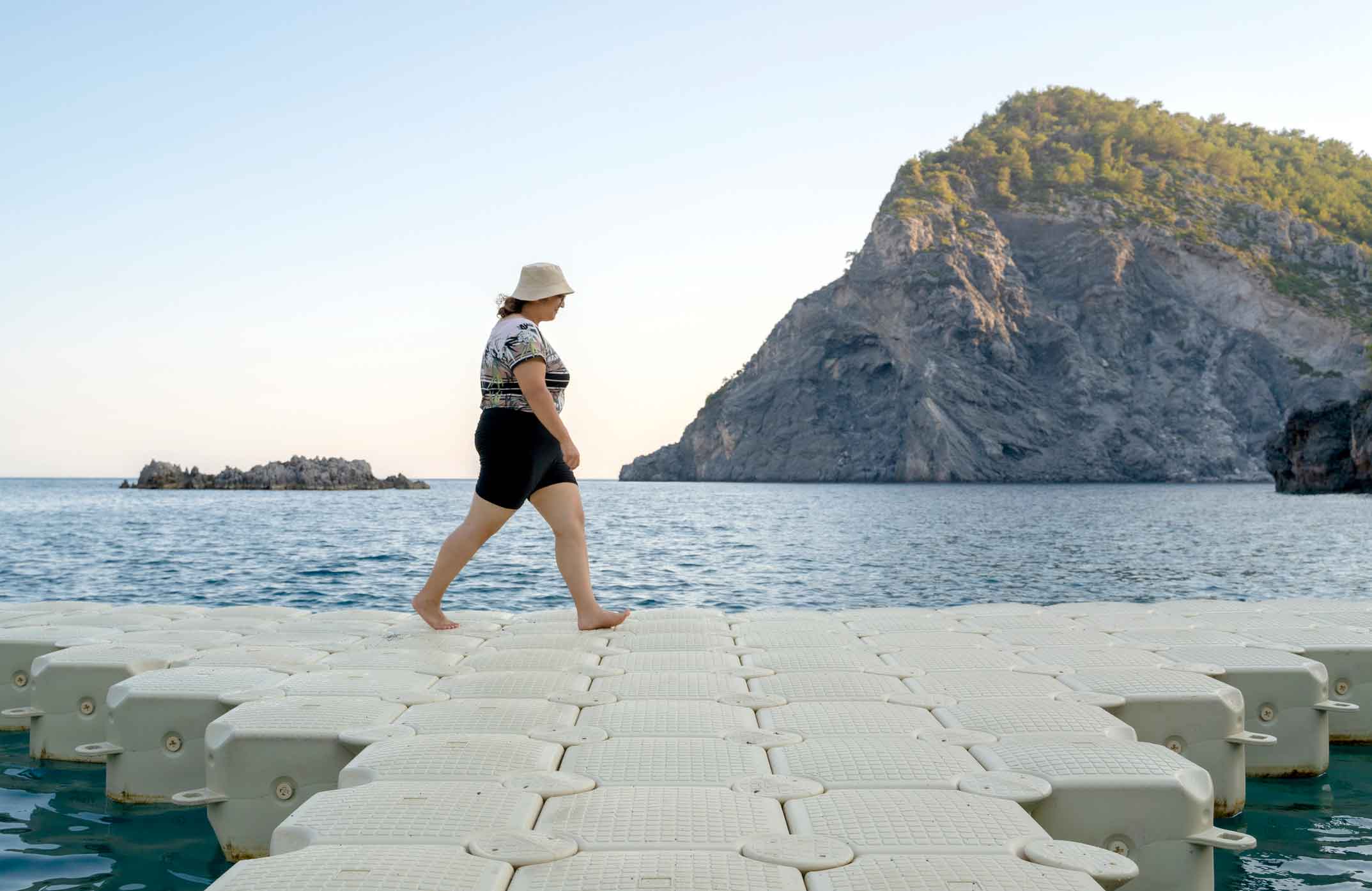 Pointing your toes outward with a greater step width