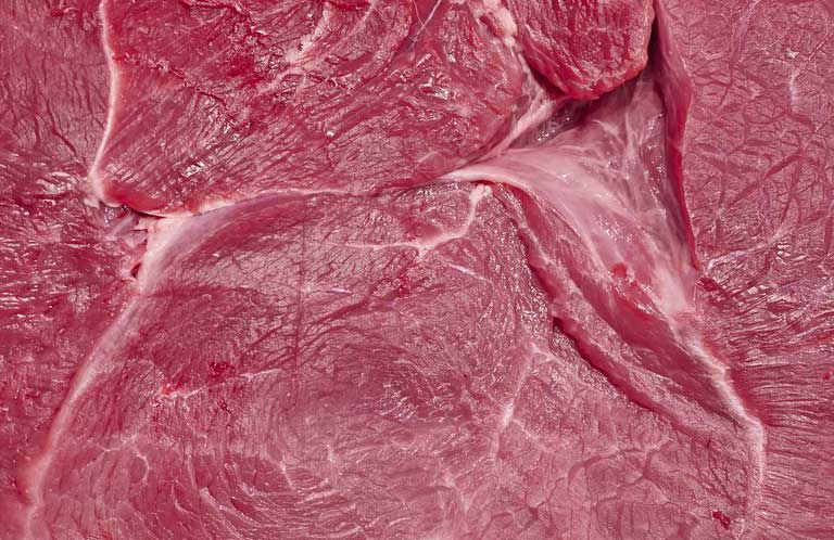 Consuming a diet high in saturated fats
