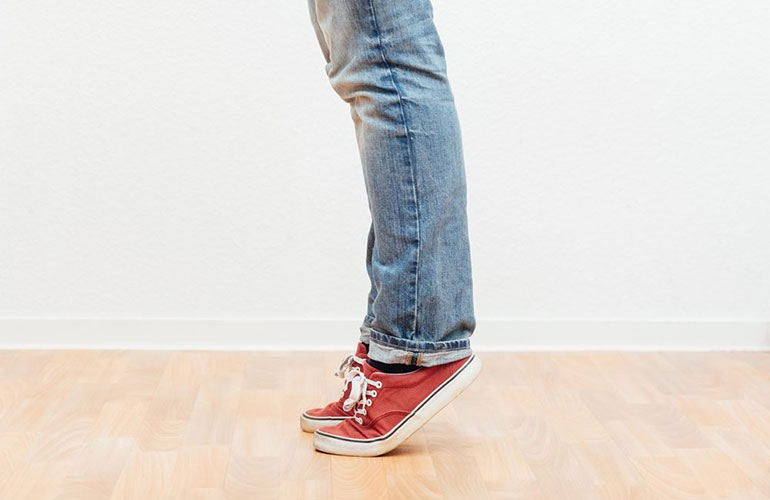 Do calf raises while waiting in line