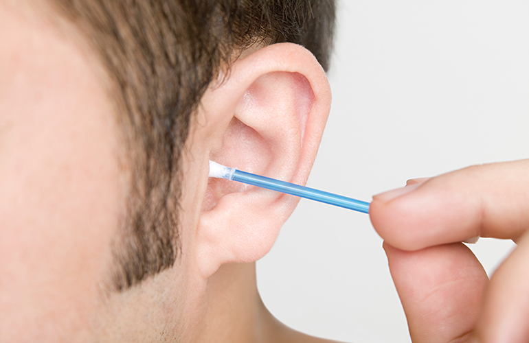 Cleaning out your ears with cotton buds