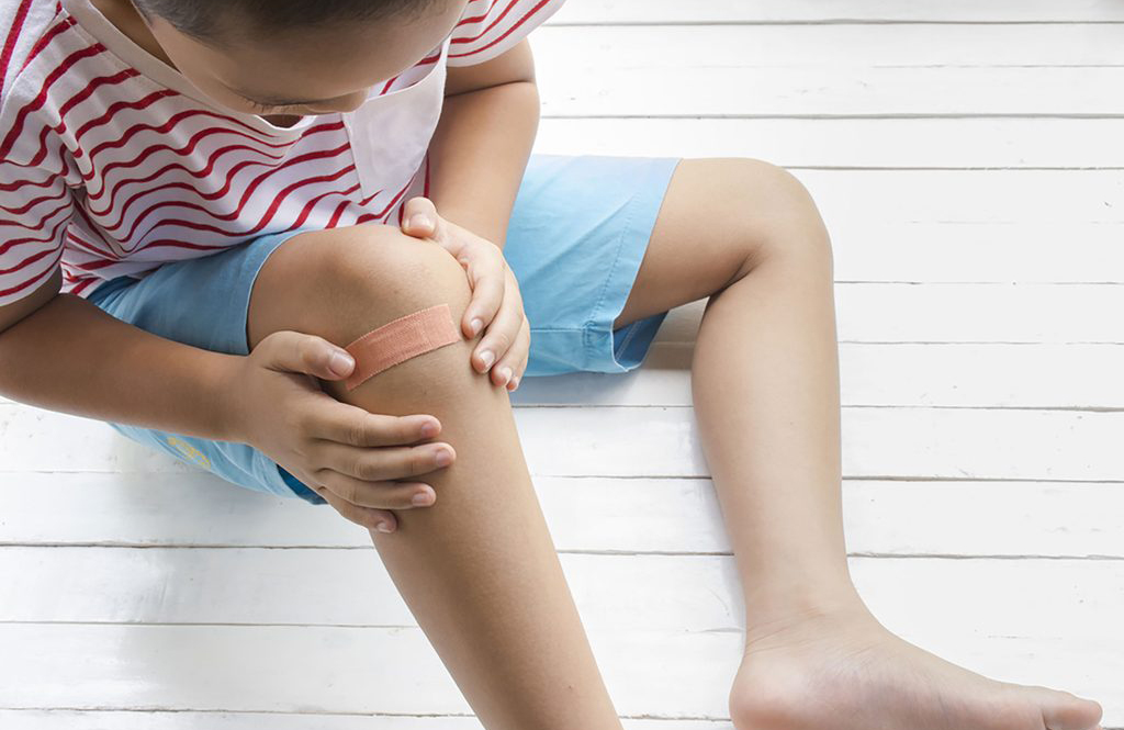 Ouchless adhesive bandage removal