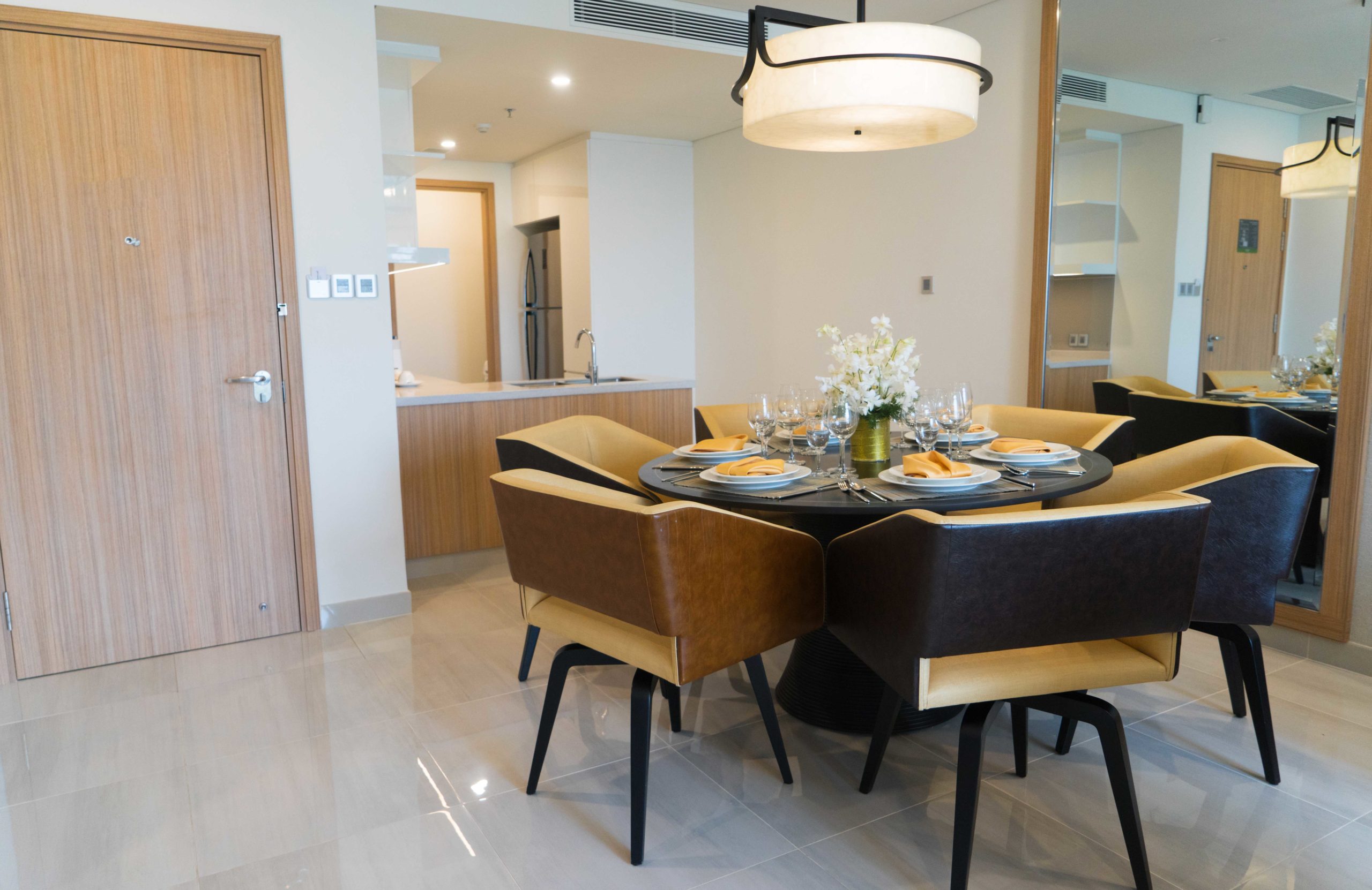 Hang a mirror opposite your seat at the table