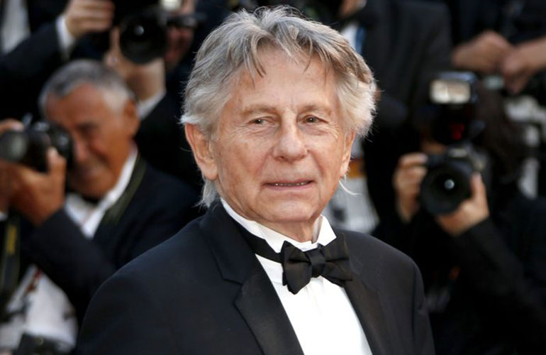 Fugitive filmmaker Roman Polanski wins Best Director