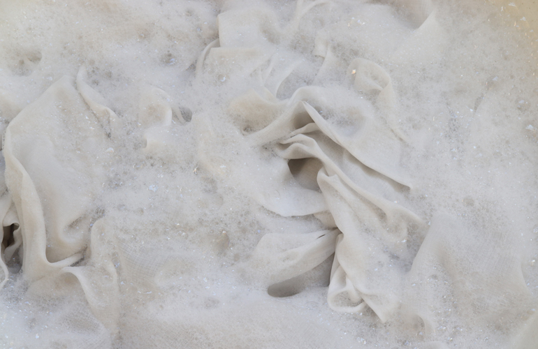 Step 2: Soak the linens