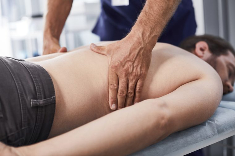 Bad posture can contribute to rib pain