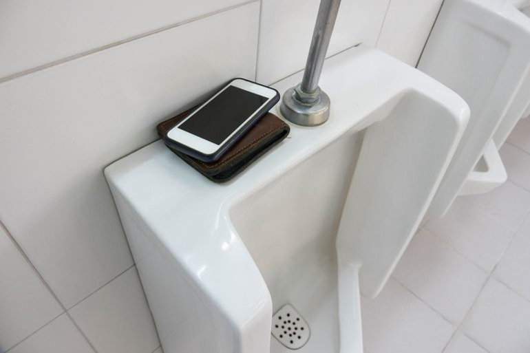Not using your phone while doing your business